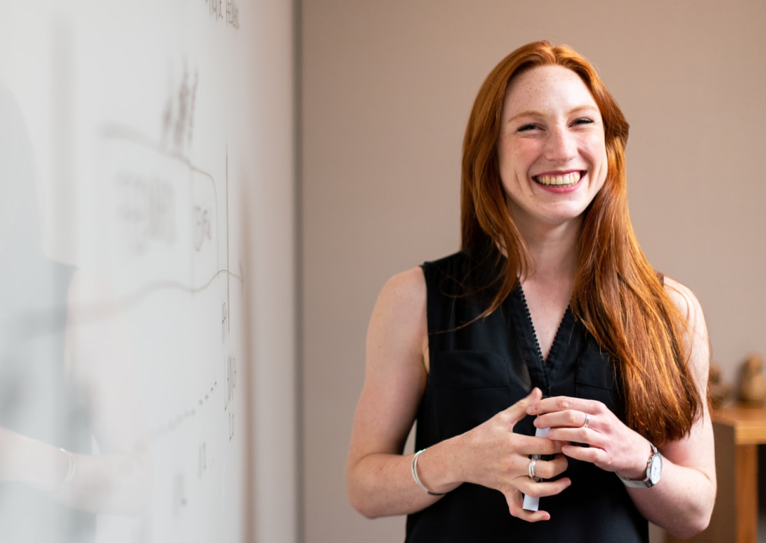 Client smiling during a consultation with Logic Partners